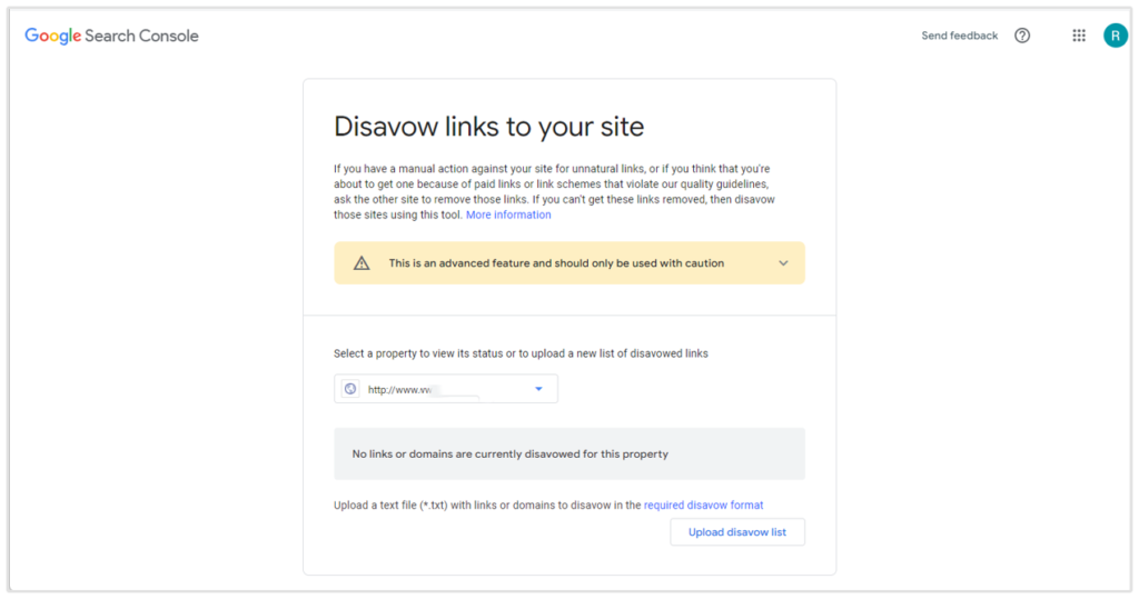 Google Search Console Disavow Tool page showing option to upload a disavow list and manage disavowed links for a selected property